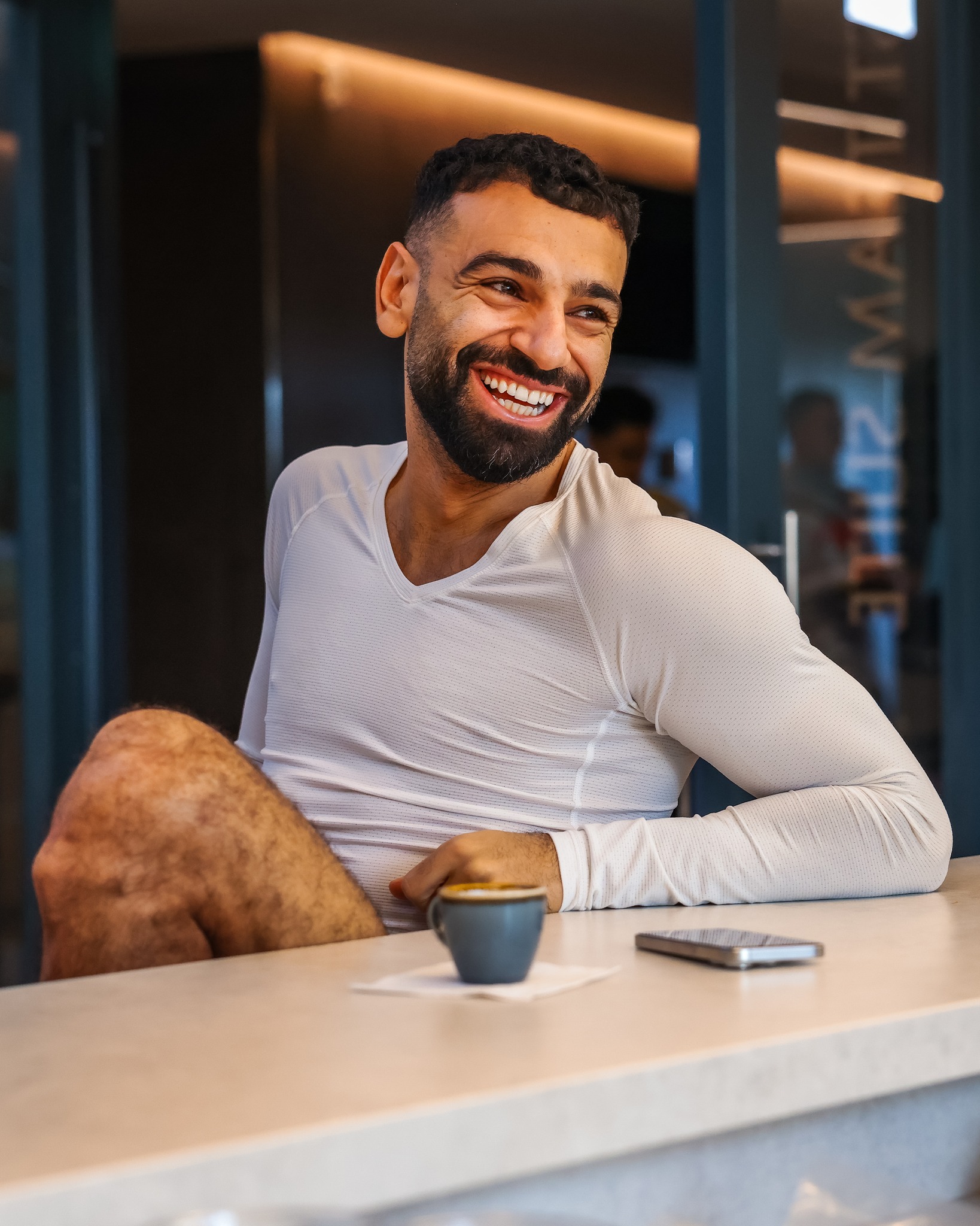 Liverpool stars beam as they joke around in coffee dock ahead of Real Madrid clash